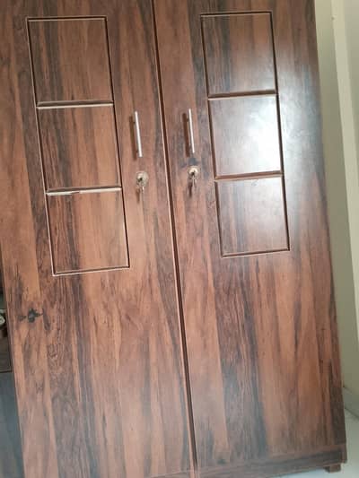 heavy wooden wardrobe neat n clean