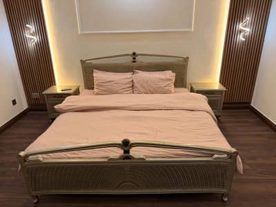 King size bed with side tables and dressing table