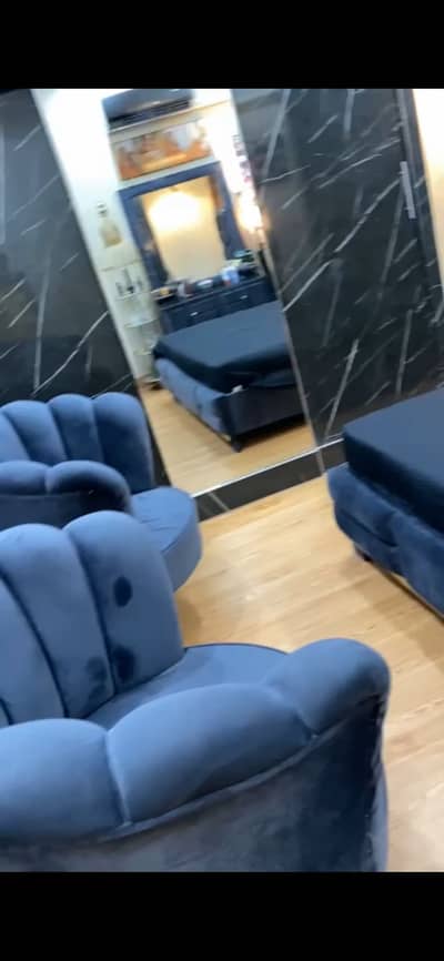 Bed set dressing and couple of chairs