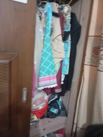 wooden sliding 3door cupboard good in condition