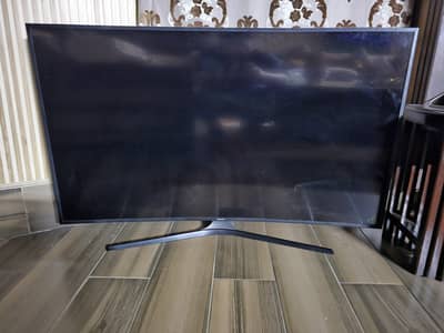Samsung 55" UHD 4K Curved Smart LED TV (Model: UA55KU7350R).