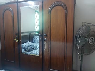 Triple door wooden wardrobe urgent sale