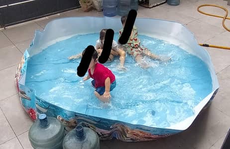 intex inflated swimming pool