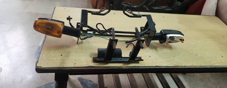 Honda deluxe head light with bracket original