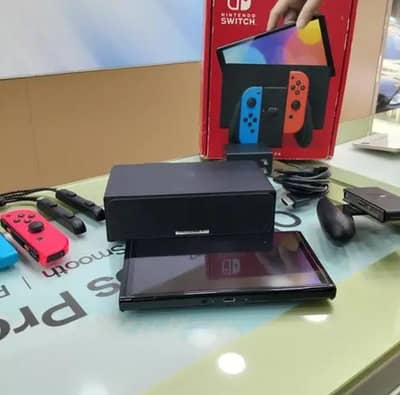 Nintendo switch 1 Oled used with box all accessories condition 9.5/10