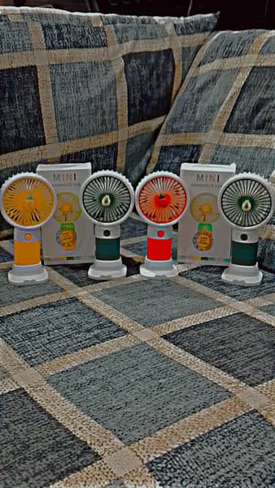 Mini portable recharge fans. Only in 950.