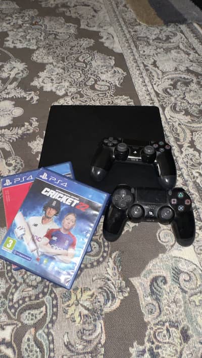 Playstation 4 slim with 2 controllers