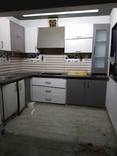 Renovated 3 bed dd ground floor portion for rent tiled and marble flooring America kitchen 24 hours water and electricity separate gate and meters