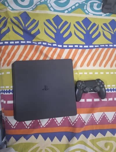 PS4 Slim slightly used in very good condition