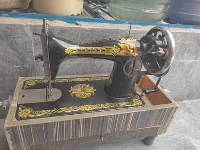 singer sewing machine with complete  box in very good condition