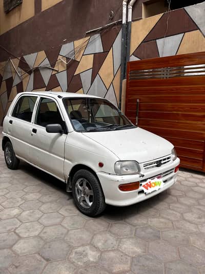 Daihatsu coure 2006 total genuine