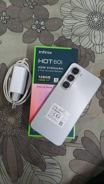 Infinix Hot 60i (6+6/128GB) with box charger 3 month warranty pari Hy