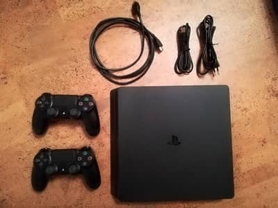 PS4 SLIM  JAILBREAK  1 TB + 17 Games & Two controllers