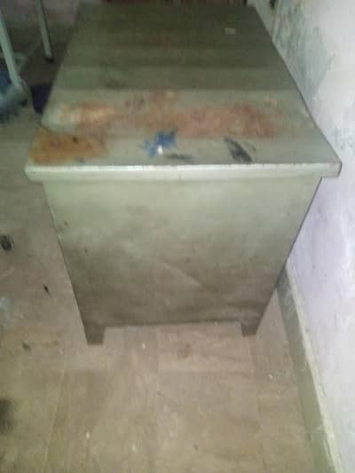 steel table with 2 big shelves good condition.