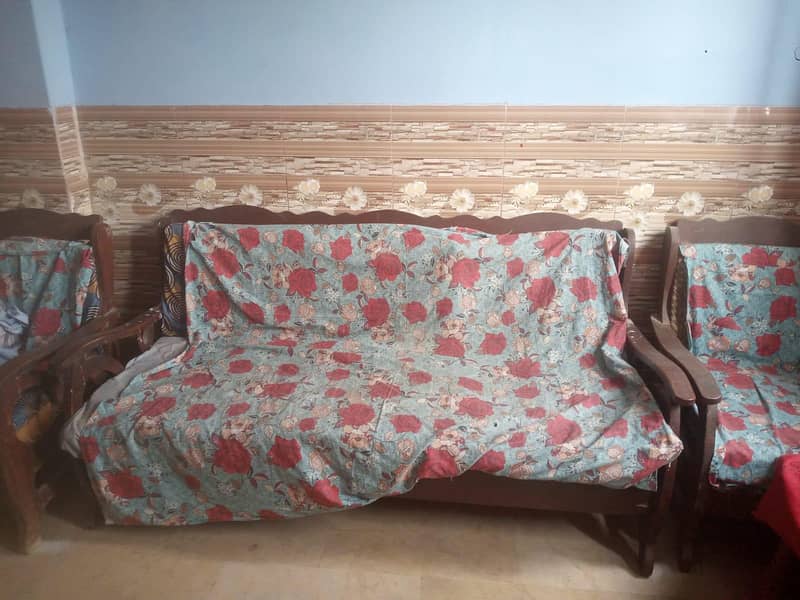 5 seater sofa.  table 1