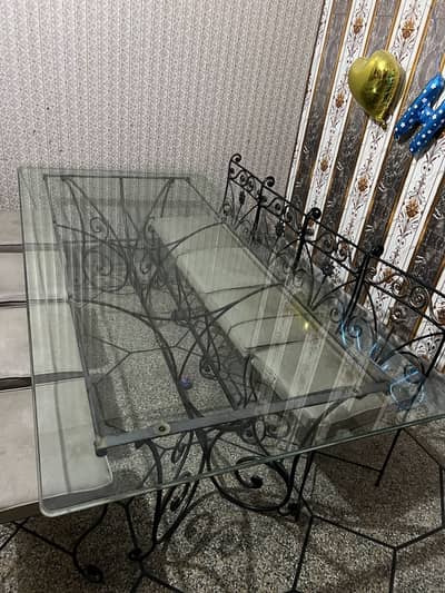 Dining table with glass top