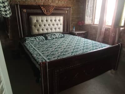 solid wooden King size bed for sale in okara
