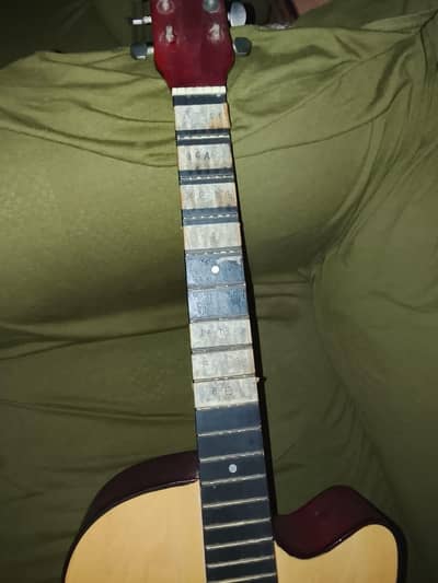 A beginner wooden guitar 