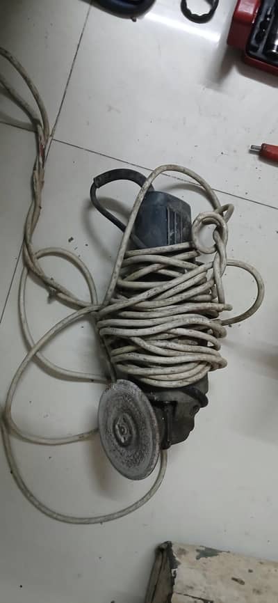 corded electric angle grinder , in working condition