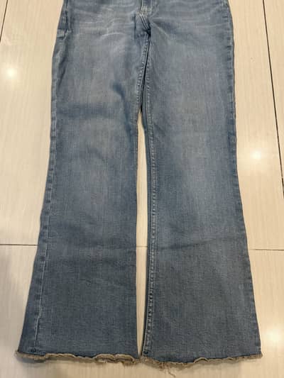 Blue Flared Bootcut Jeans with Raw Hem
