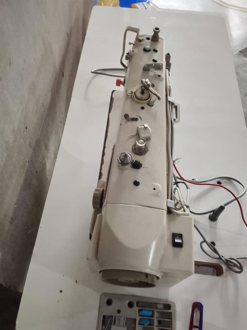 sewing machine 16