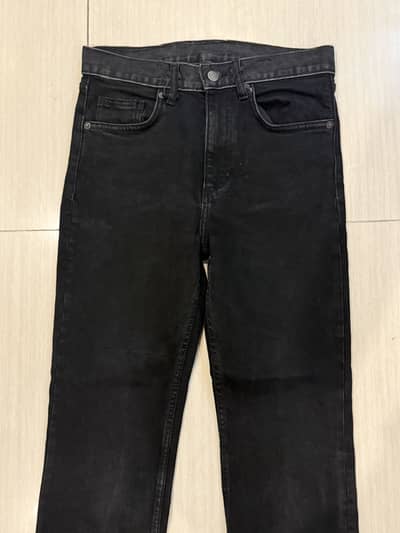 Black Cropped Flare Jeans with Raw Hem
