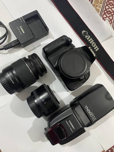 600 Canon camera with 2 lens