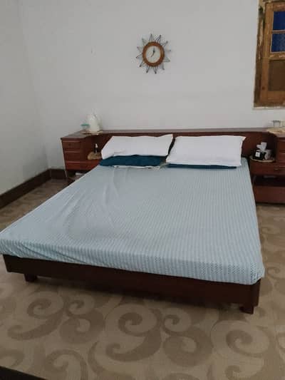 Solid wooden bed set.