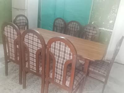 Solid wooden dining table set with 8 years- excellent condition.