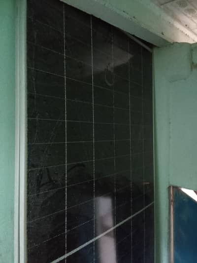2 solar panels in rust condition and one solar panel bullet damage but