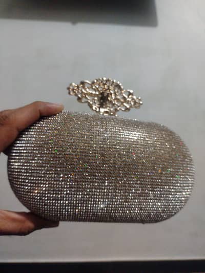 branded clutch only one time used like new