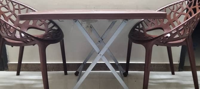 4 seater dining table, brown colour, plastic, excellent quality and c