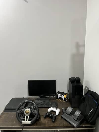 Ps4 and steering wheel with 2 controllers