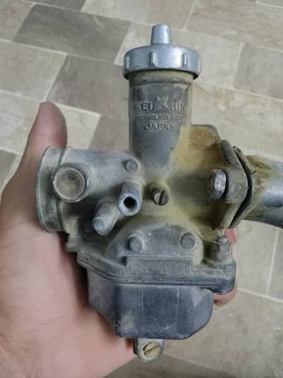 125 carburetor moti slide