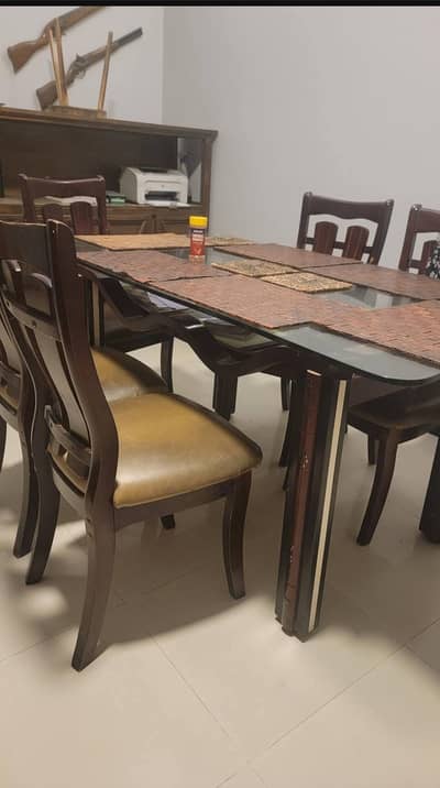 Dining Table with 6 cushion Chairs.