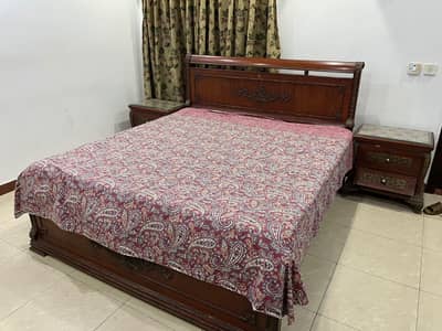 double bed with side table and dressing table with foam