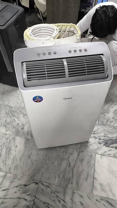 midea portable ac new in condition