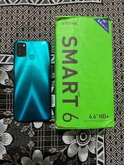 Infinix Smart 6 mbl for sale total jenmon with box,,