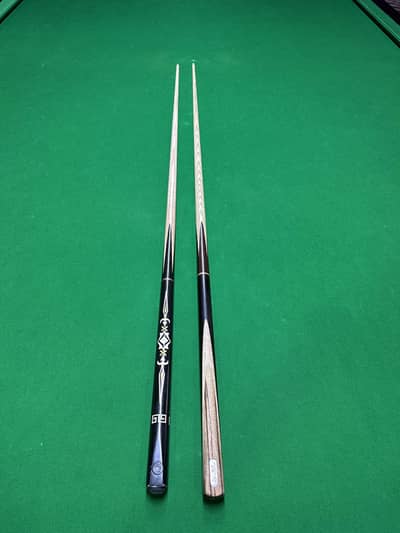 2 cues available for sale in good condition