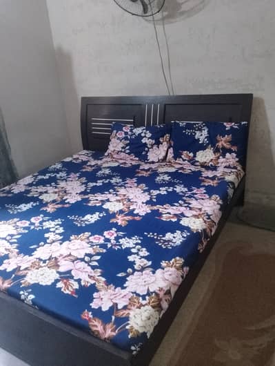 Bed and wardrobe with mattress