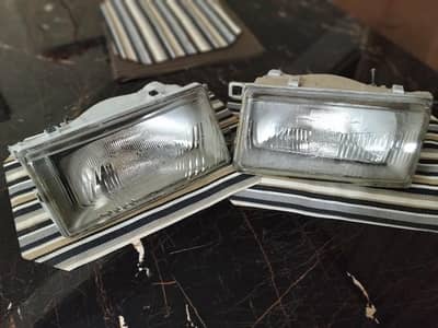 86 Corolla 100% original headlamps