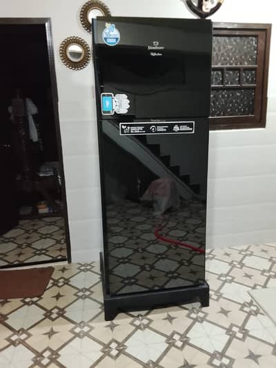 This is a *Dawlance Reflection Series* refrigerator with black glass d