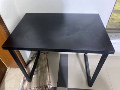 Black wooden table 5 by 4 foot