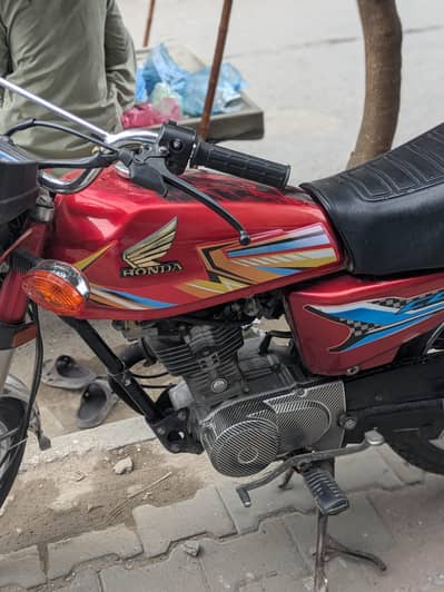 rp 125cc