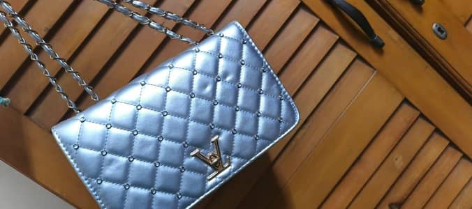 silver cross bag
