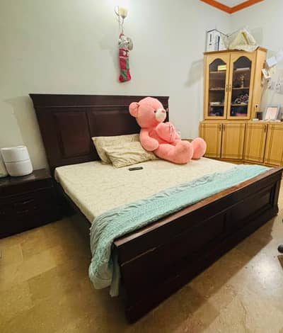 bed with dressing table and side corners