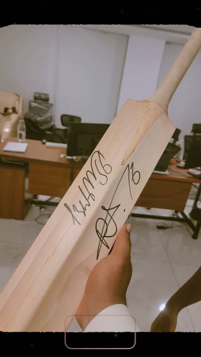 Cricket bat with Babar Azam and M. Rizwan signature bat