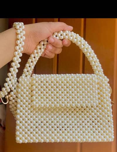 Beautiful pearl beaded handmade bag available