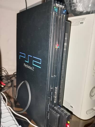 PS2 FAT Canadian Original with 1 Wireless Controller and 3 CDs