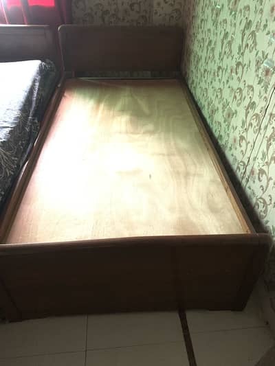 Single wooden bed